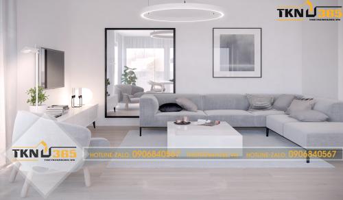 Nội thất phòng khách được thiết kế hiện đại chỉ với hai tông màu trắng  và xám
