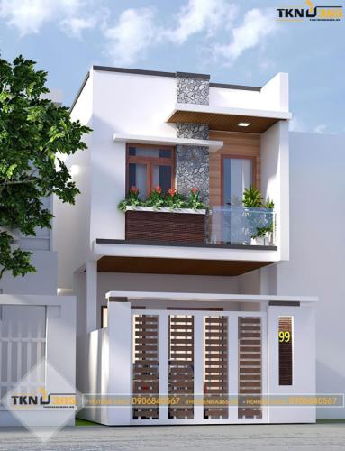 Ngôi nhà với tông màu trắng làm chủ đạo, mặt tiền có cột ốp đá tạo điểm nhấn