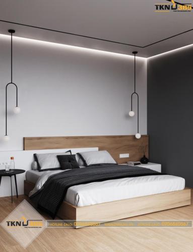 Phòng ngủ với nền và giường được làm bằng gỗ công nghiệp